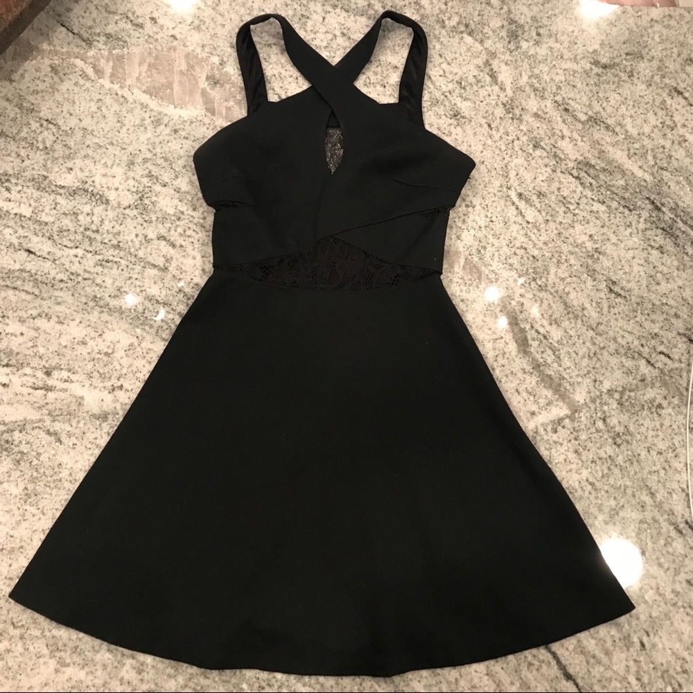 Little black dress with lace cutouts
